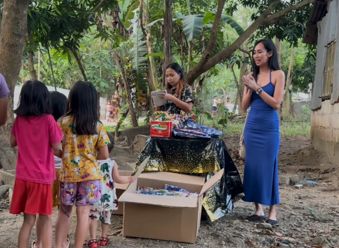 Children receiving school supplies